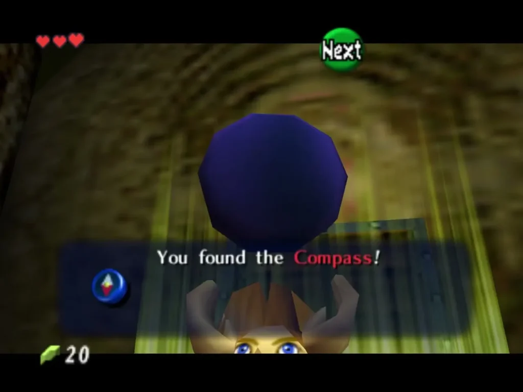Link holding up the Compass after finding it in the chest Link holding up the Compass after finding it in the chest