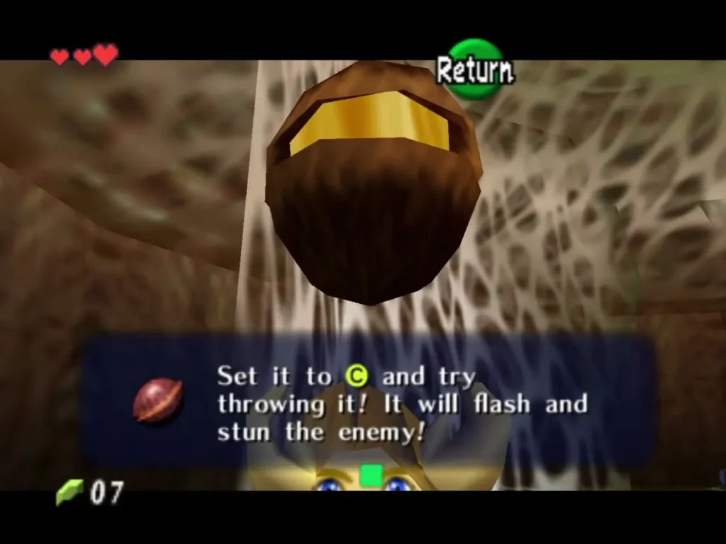 Deku Nut item box telling Link to set the nuts to C and throw them to stun enemies Deku Nut item box telling Link to set the nuts to C and throw them to stun enemies