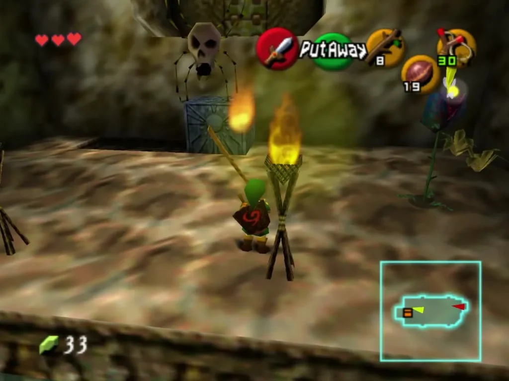 Link lighting the two torches on the far side of the room with a Deku Stick Link lighting the two torches on the far side of the room with a Deku Stick