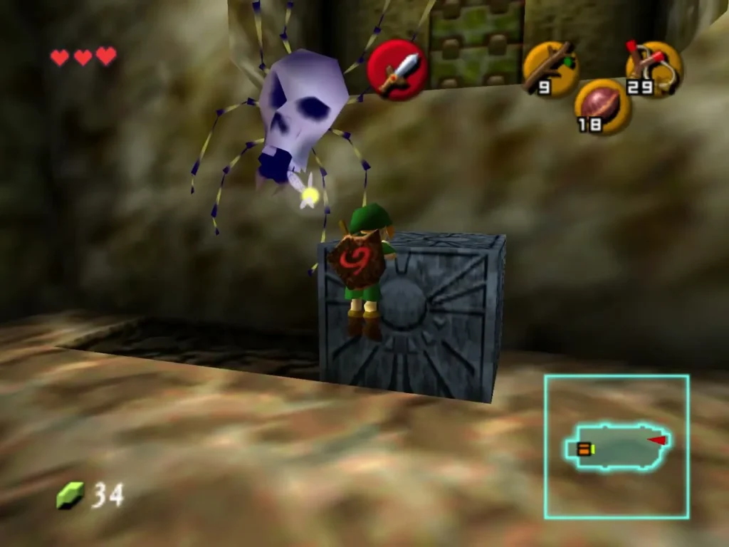 Link standing on the stone block under a Big Skulltula hanging from the ceiling Link standing on the stone block under a Big Skulltula hanging from the ceiling