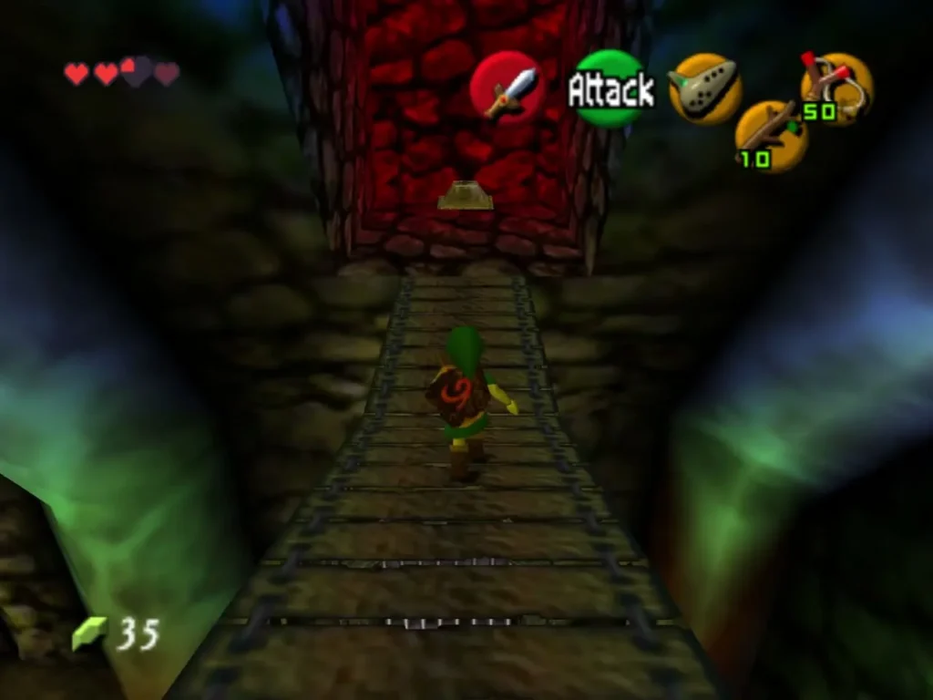 Link crossing the wooden bridge over the skull toward a red stone doorway