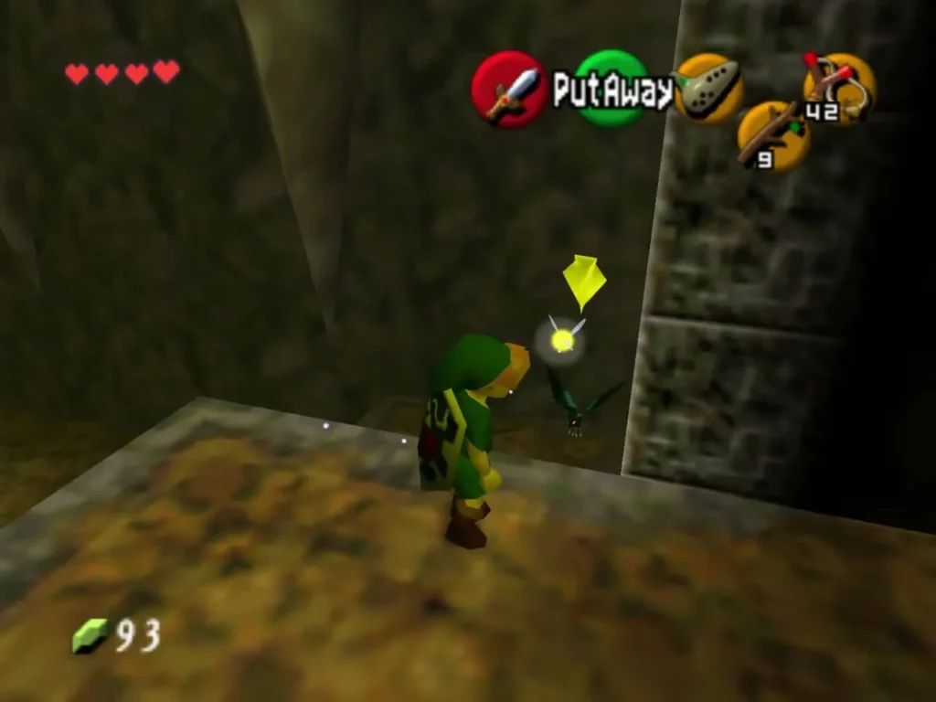 Link on a stone ledge with a Keese flying nearby beside the wall