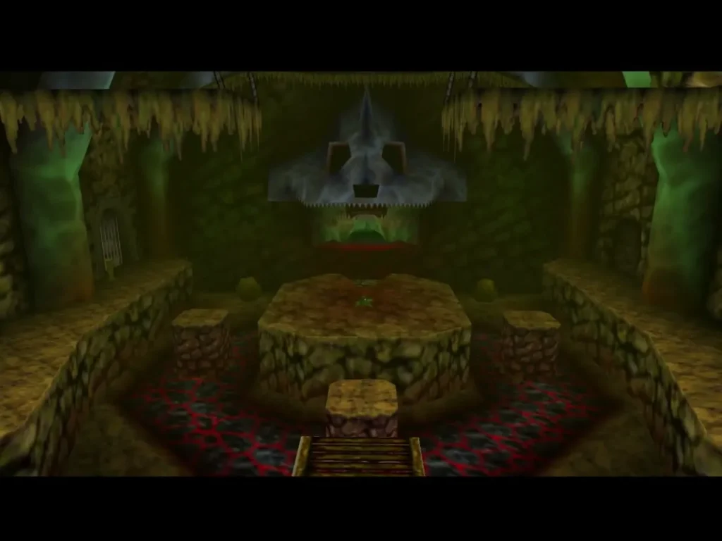 Link standing in the Dodongo's Cavern lobby facing the carved skull over the lava