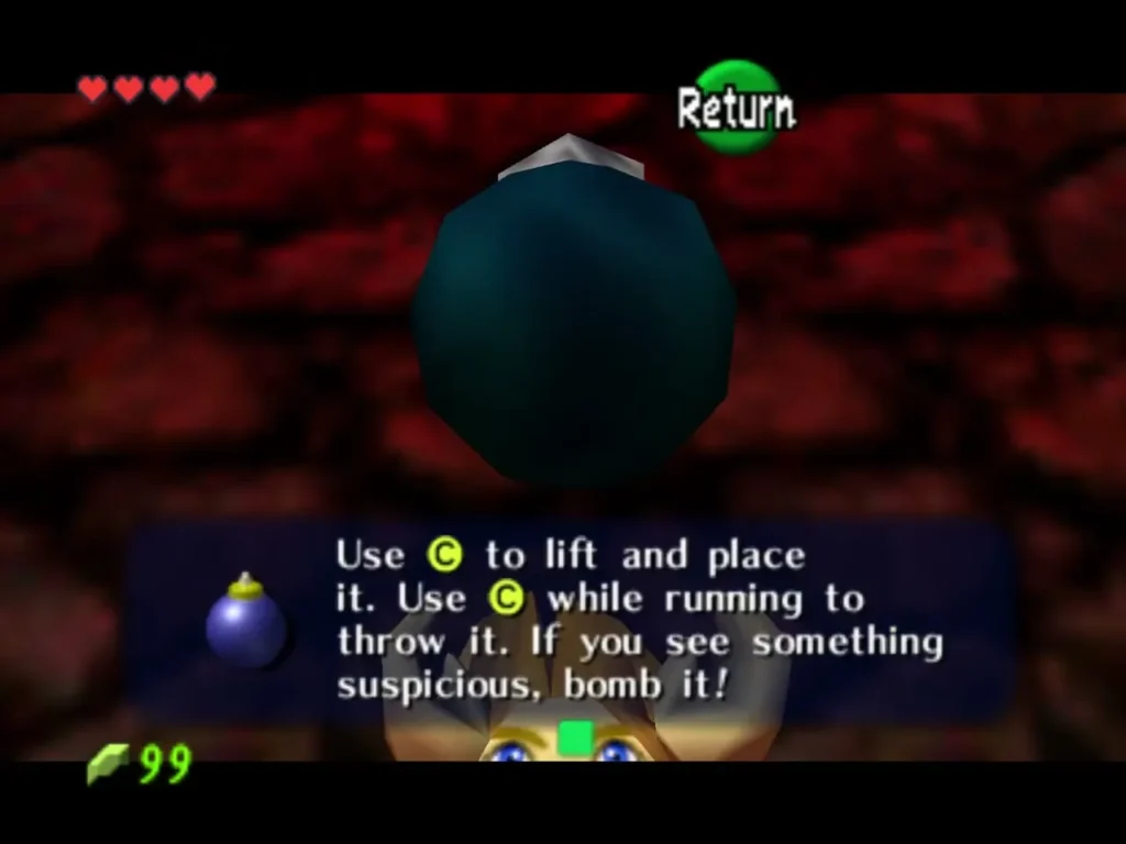 Message box explaining how to lift and throw a bomb, with a bomb above Link