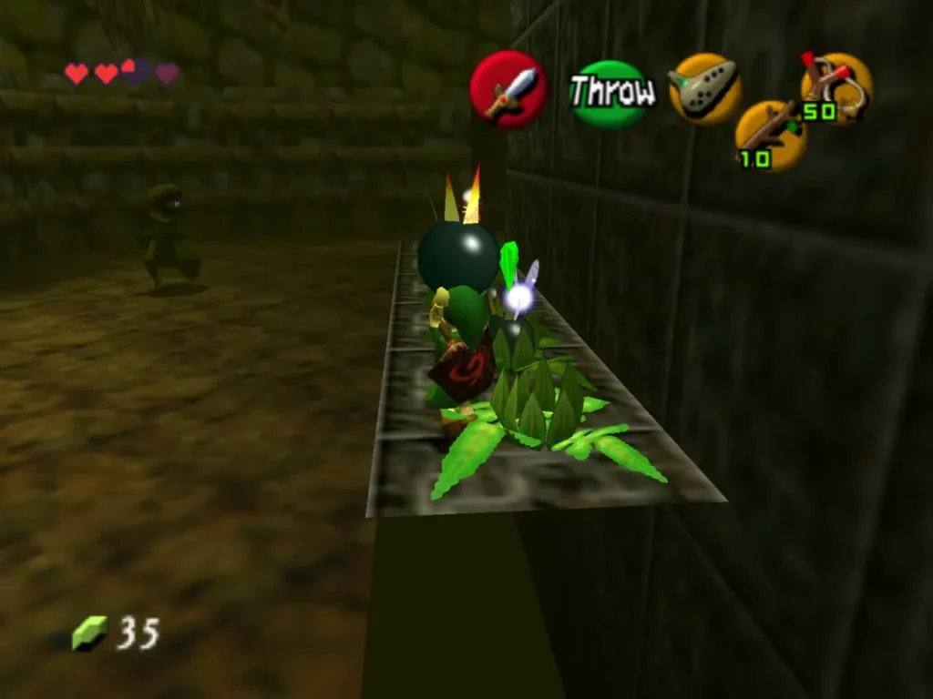 Link throwing a Bomb Flower onto a ledge of bomb flowers beside the stone pillar