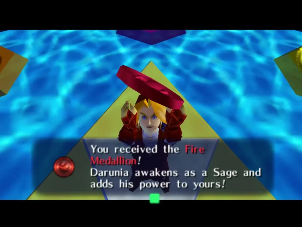 Link raising the Fire Medallion overhead beside the You received the Fire Medallion message