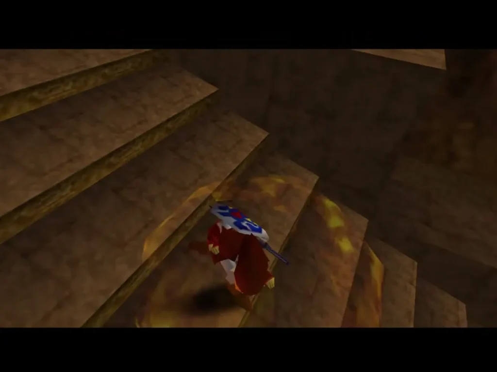 Link climbs the stone staircase with flames rising around him in the entrance hall