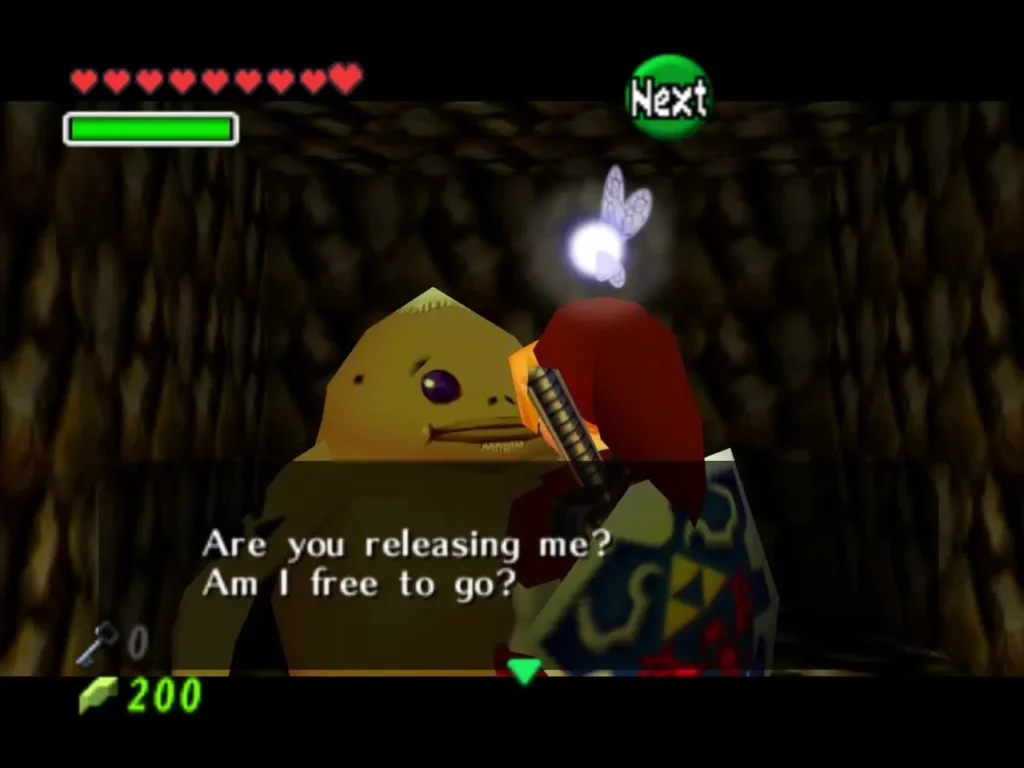 The freed Goron asks Link whether he is free to go, text box fully shown