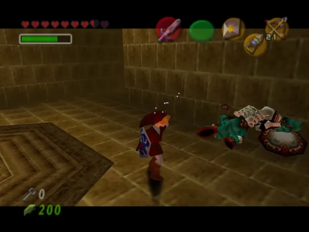 Link stands over a defeated Stalfos on the floor of the stone hall