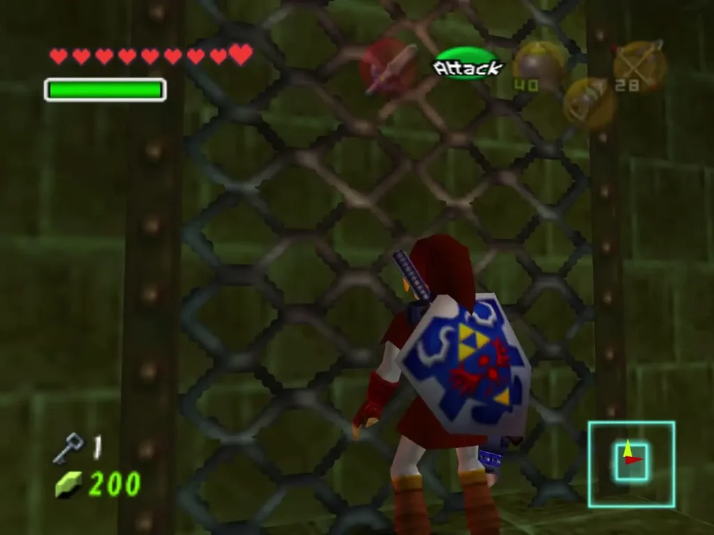 Link climbing a chain-link grate in the green-tiled passage