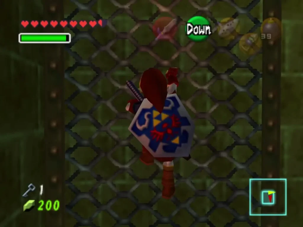 Link climbing up a chain-link grate in the fire temple