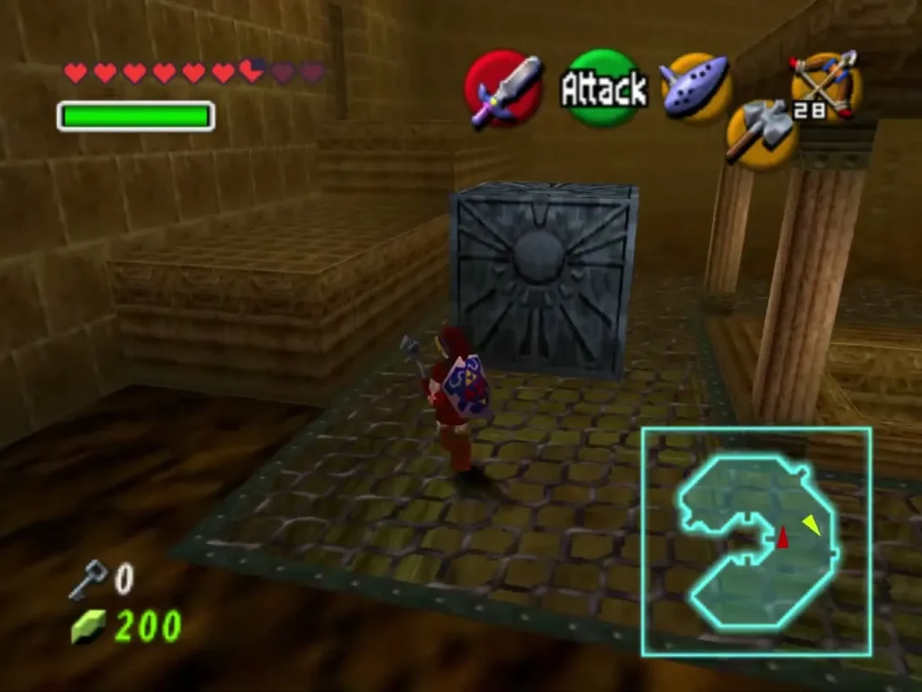 Link beside a stone face block in the C-shaped chamber