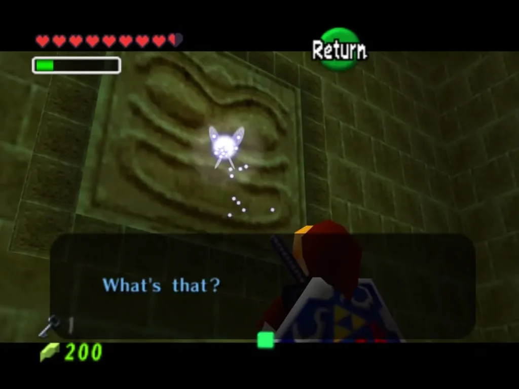 A glowing Hookshot target on a carved stone face, with a What's that? message