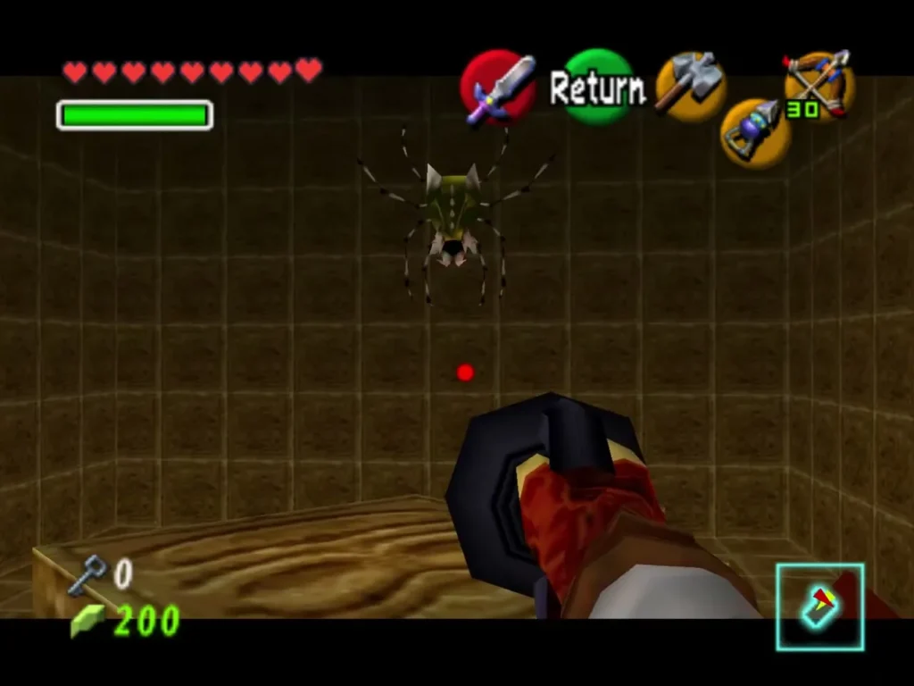 A Gold Skulltula clinging to a dungeon wall as Link aims the Hookshot