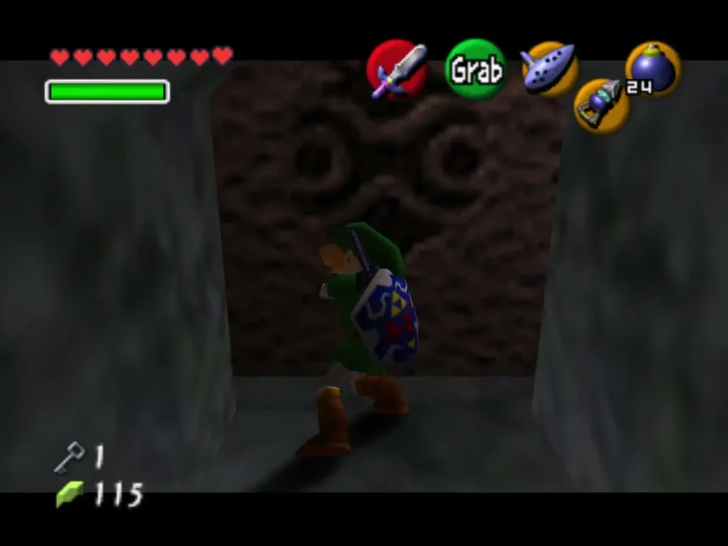 Link facing a carved block set into the stone wall