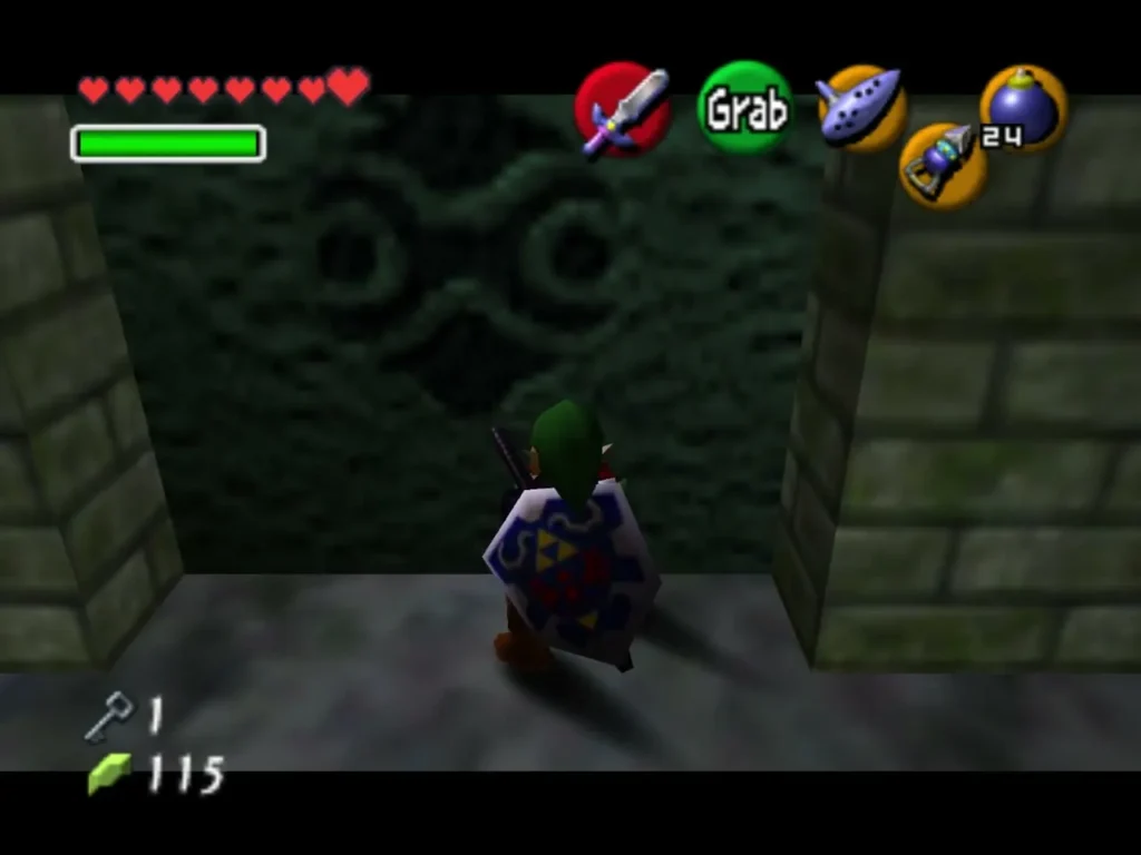 Link facing a carved stone block set into the corridor wall