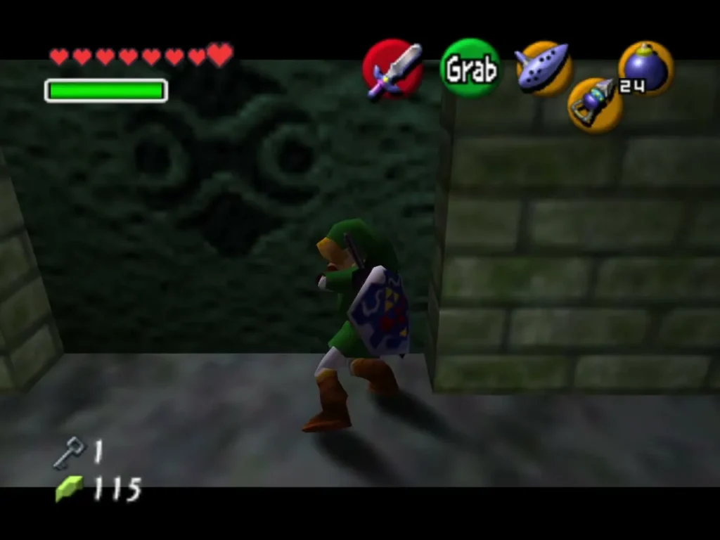 Link gripping a carved block in the narrow stone corridor