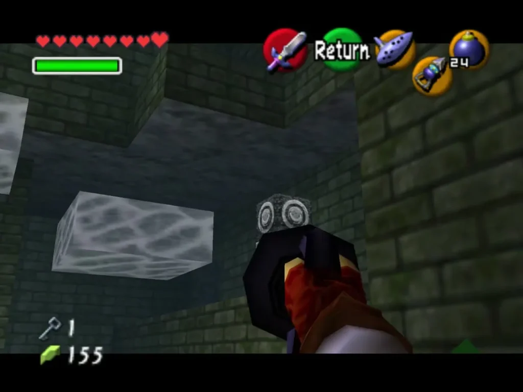 Link aiming the Hookshot at a silver target beside a transparent block