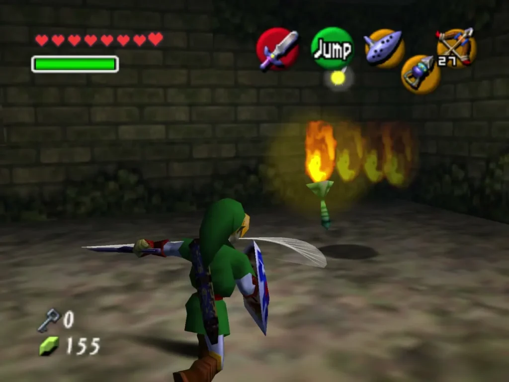 A torch burning with flames in a stone room as Link swings his sword