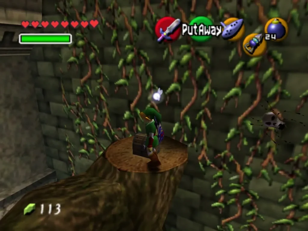 Link standing on a tree stump beside a chest and a Skulltula on the vines