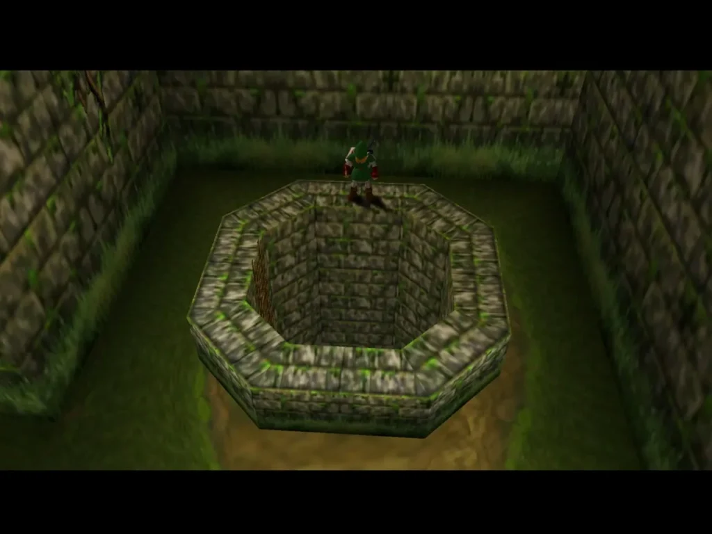 Link standing on the rim of the well after the water has drained