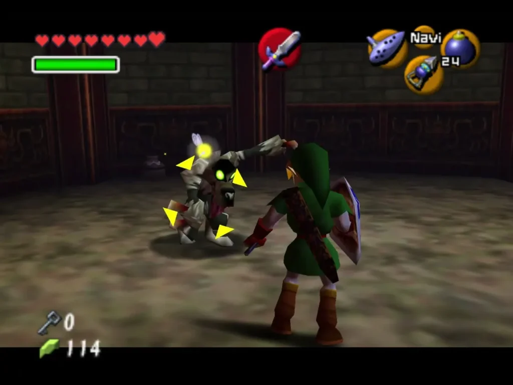 Link fighting a Wolfos in the dim stone room