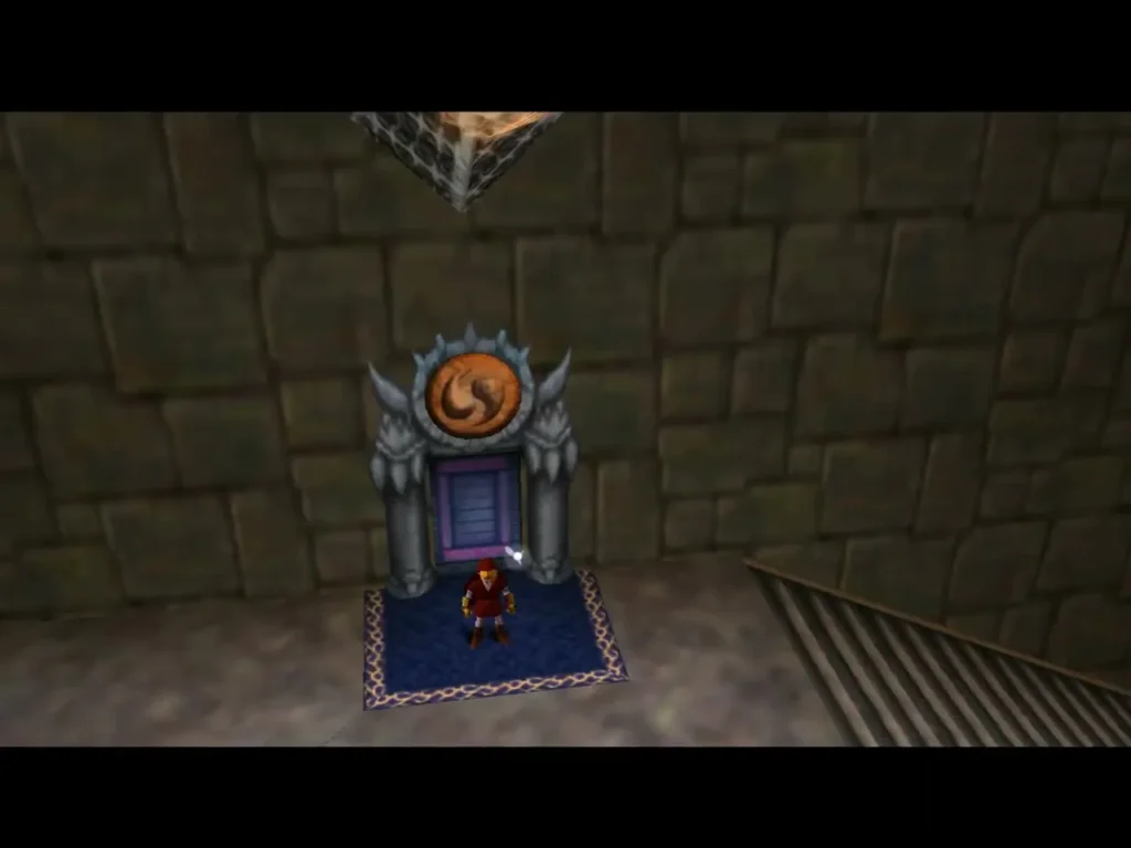 Link standing on the blue carpet before the locked door with the Spirit symbol Link standing on the blue carpet before the locked door with the Spirit symbol