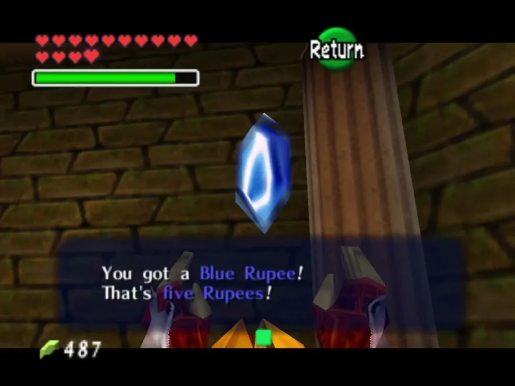 Link receiving a Blue Rupee from the sand room chest, worth five Rupees Link receiving a Blue Rupee from the sand room chest, worth five Rupees