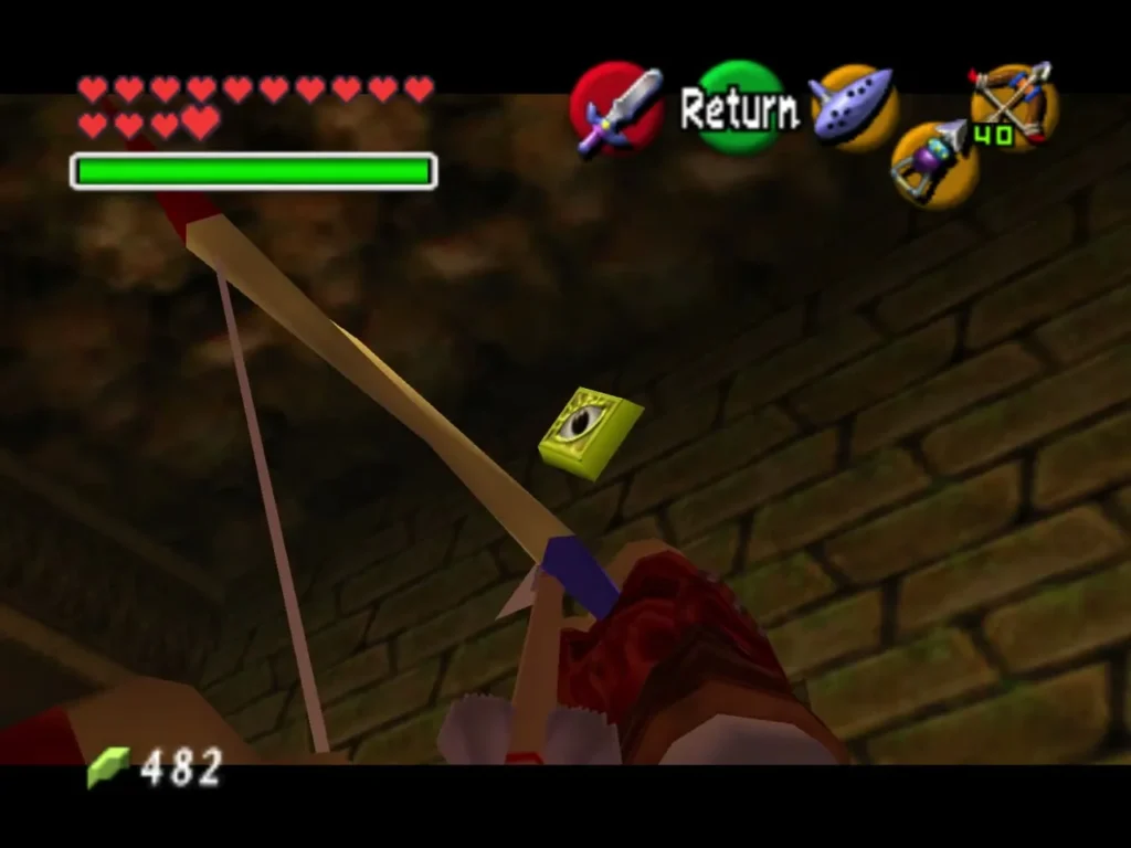 Link aiming his bow at the gold eye switch above the hall door Link aiming his bow at the gold eye switch above the hall door