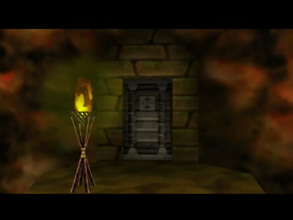 A stone side door in the lava room beside a lit torch A stone side door in the lava room beside a lit torch