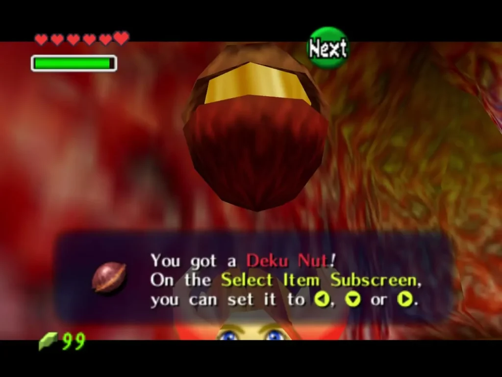 Link holding up a Deku Nut with its name box on screen Link holding up a Deku Nut with its name box on screen