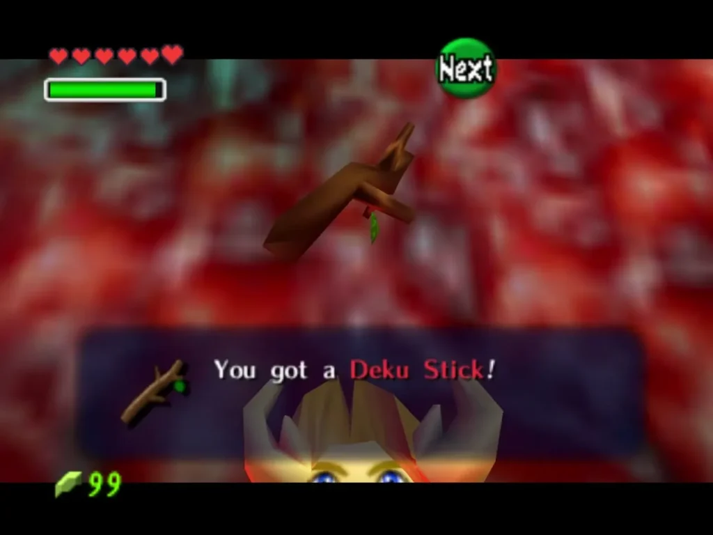 Link's message box reading You got a Deku Stick, with the stick held above him Link's message box reading You got a Deku Stick, with the stick held above him