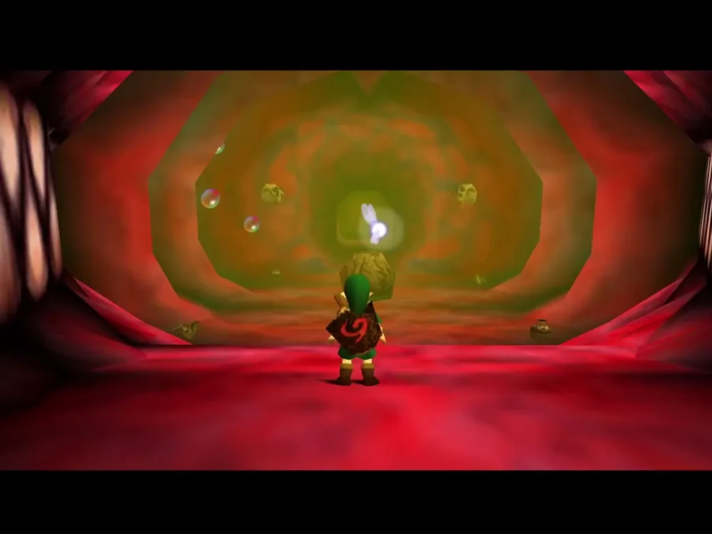 Link walking into the red entrance chamber of Jabu-Jabu's belly Link walking into the red entrance chamber of Jabu-Jabu's belly