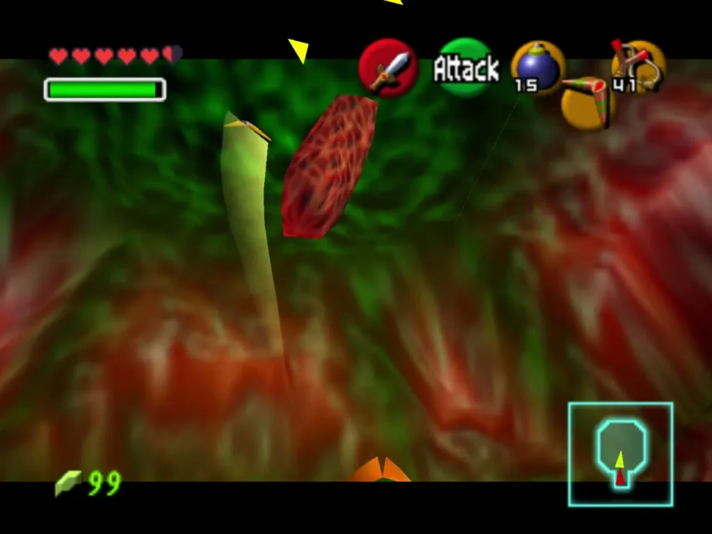 A red wriggling growth hanging in a green chamber A red wriggling growth hanging in a green chamber