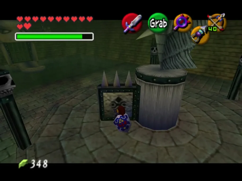 Link pushing the stone beak statue across the floor of the skull room