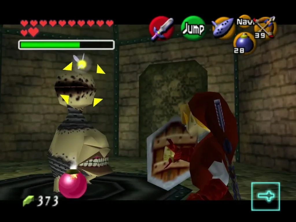 A bomb lands at the feet of a Beamos statue while Link stands nearby