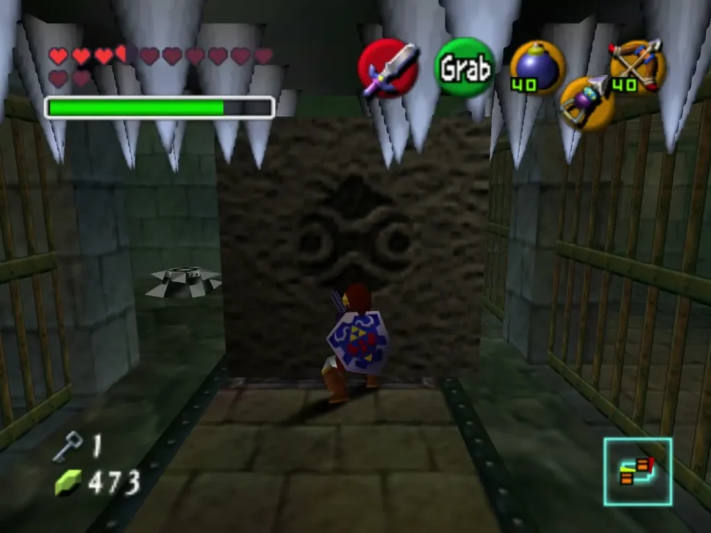 Link in a corridor under falling spikes, facing a carved stone block