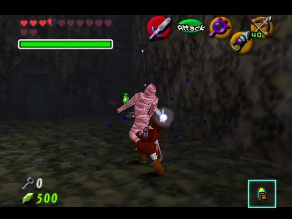Link fighting a Gibdo mummy in a dim stone room