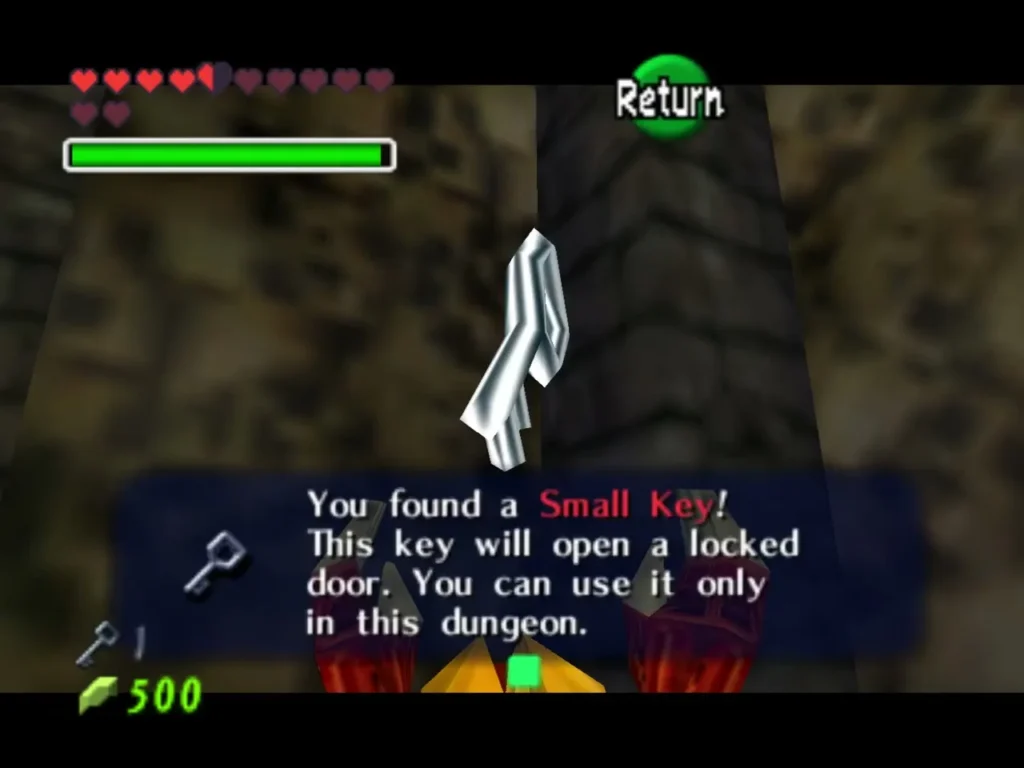 A Small Key floats between red claws with the full You found a Small Key message on screen