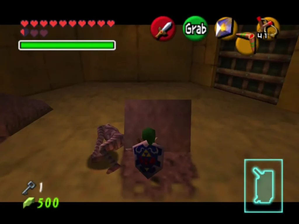Link pulling a gravestone with a Gibdo wrapped beside it Link pulling a gravestone with a Gibdo wrapped beside it