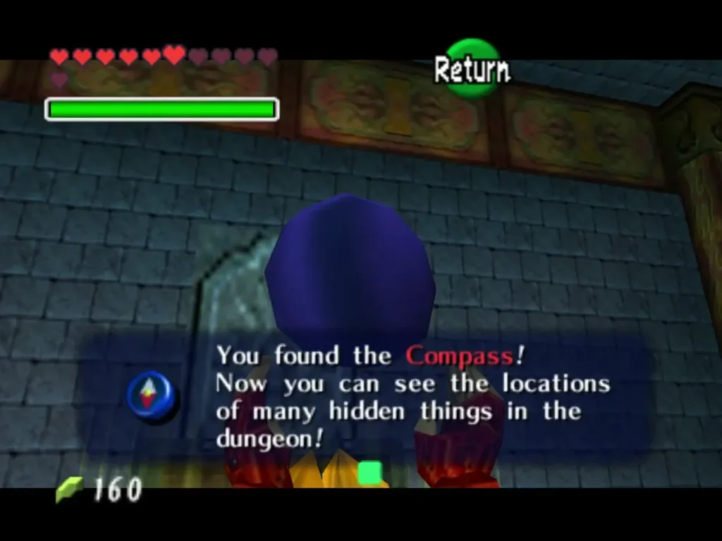 The Compass held up with its item box explaining hidden things in the dungeon The Compass held up with its item box explaining hidden things in the dungeon