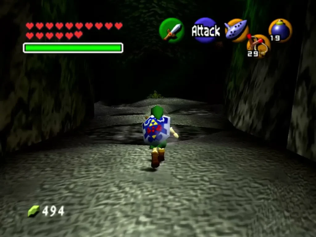 Link running through a dark rocky grotto passage Link running through a dark rocky grotto passage