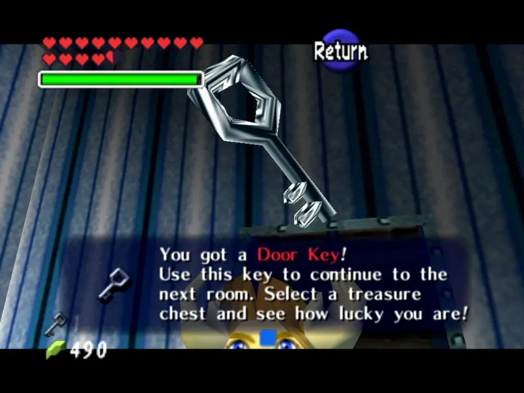 Link holding up a Door Key with the You got a Door Key message box Link holding up a Door Key with the You got a Door Key message box