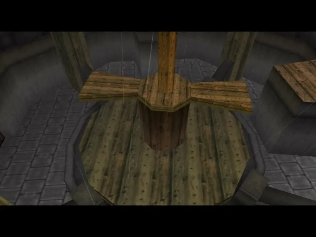Inside view of the windmill blades turning above the grinding stone