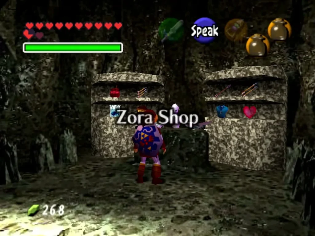 Link standing at the counter of the Zora Shop with shelves of potions, arrows and a tunic behind it