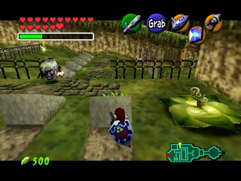Adult Link in the Graveyard beside the bean leaf with the Grab prompt showing at a block Adult Link in the Graveyard beside the bean leaf with the Grab prompt showing at a block