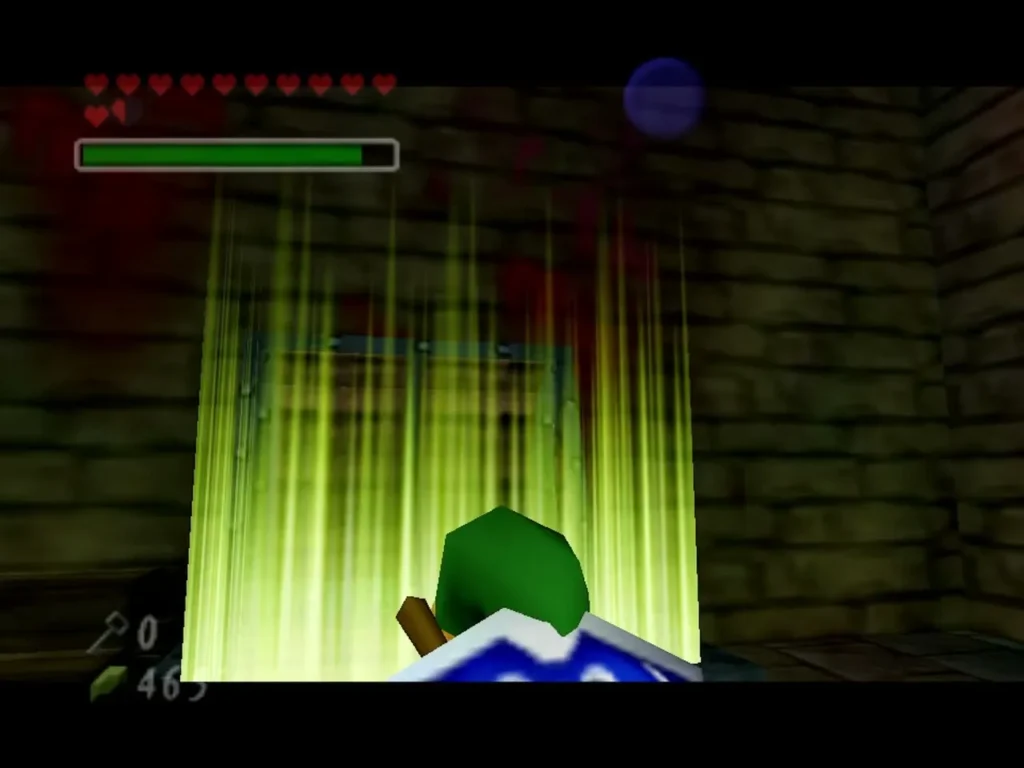 Link opening the chest inside the fenced cell in the Bottom of the Well central room