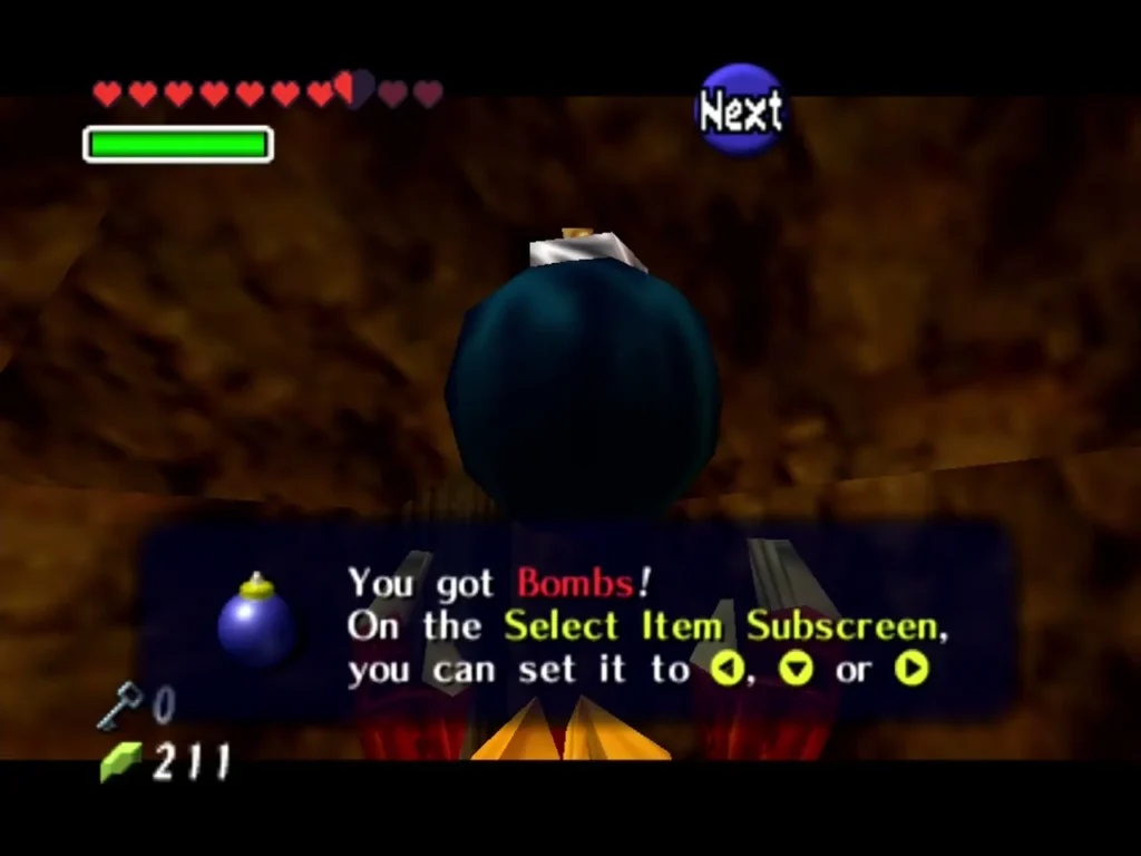 Link holding up a bomb with the You got Bombs box on screen Link holding up a bomb with the You got Bombs box on screen