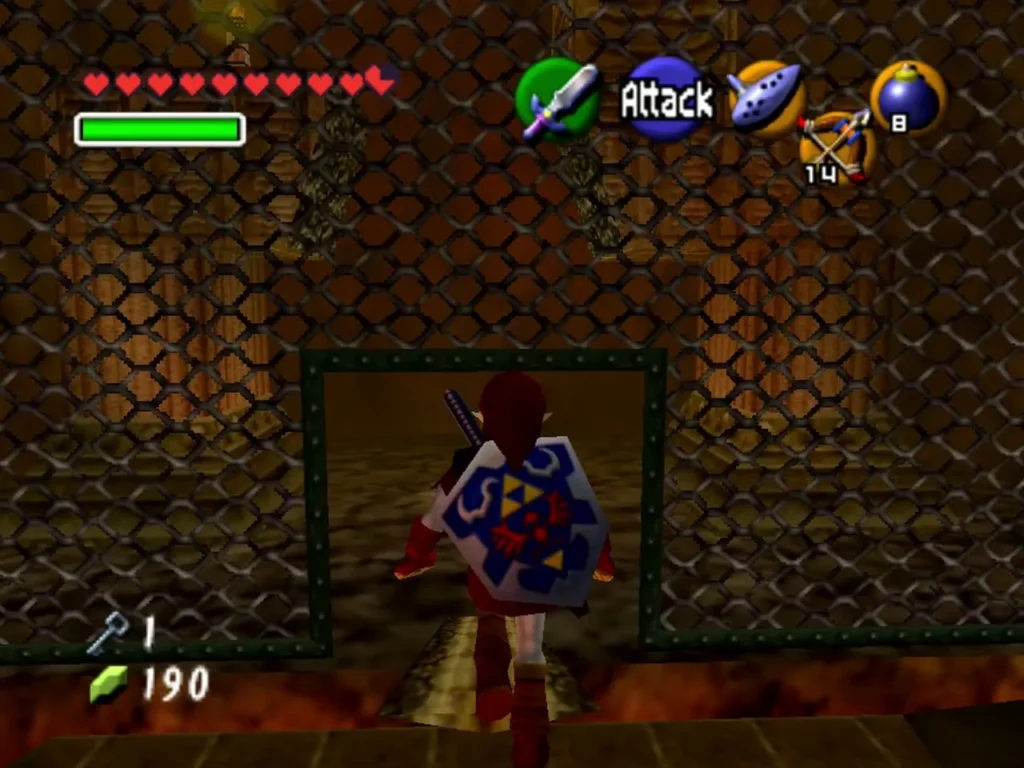 Link facing a chain-link cage doorway in the Fire Temple Link facing a chain-link cage doorway in the Fire Temple