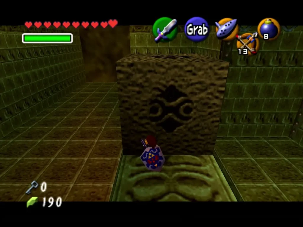 Large stone block sitting in its slot on the Fire Temple floor Large stone block sitting in its slot on the Fire Temple floor